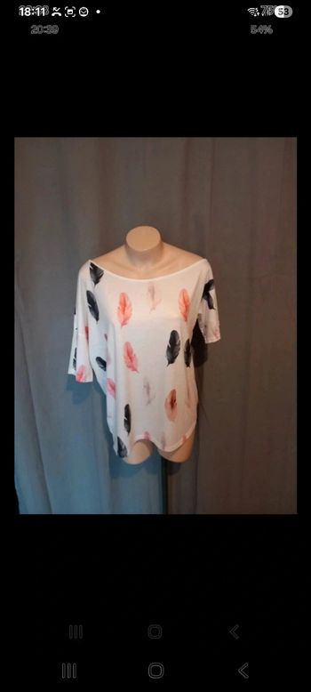 Très jolie haut taille L