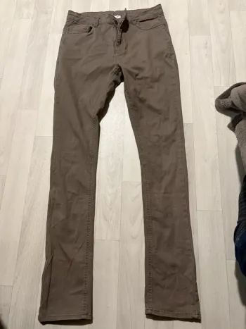 Jean kaki orchestra 14 ans slim très bon état