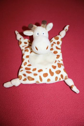 Doudou girafe en parfait état
