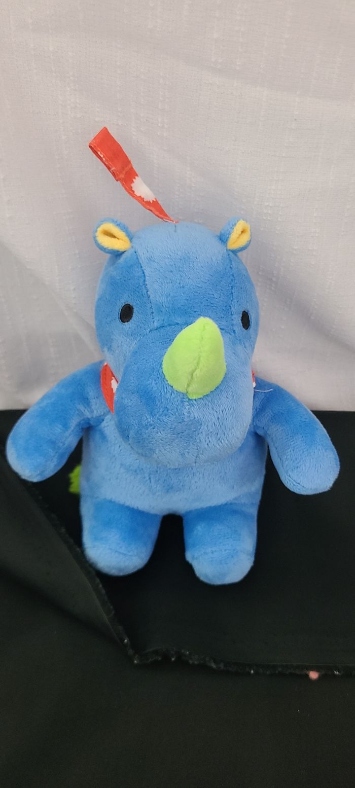 Doudou musical rhinocéros bleu vert jaune LUPILU