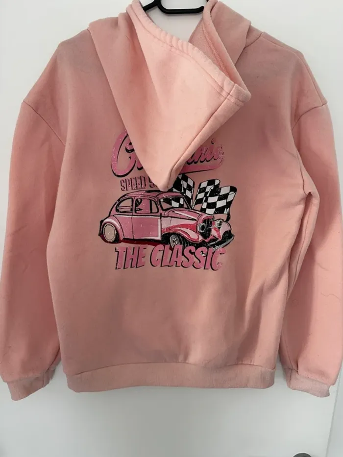 Sweat rose à capuche