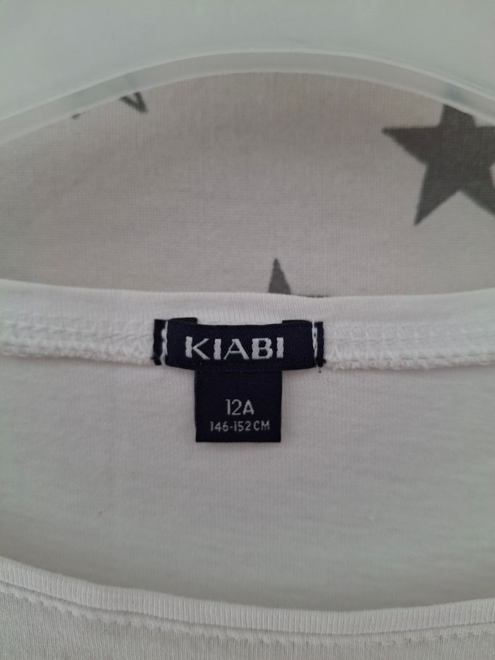 Tee-shirt blanc avec ananas 12 ans Kiabi 
 bon état ni trous ni tache - photo numéro 4