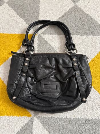 Sac à main en cuir Coccinelle couleur noir