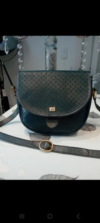 Sac à bandoulière vintage de la marque Jacques Estérel  une pièce à saisir