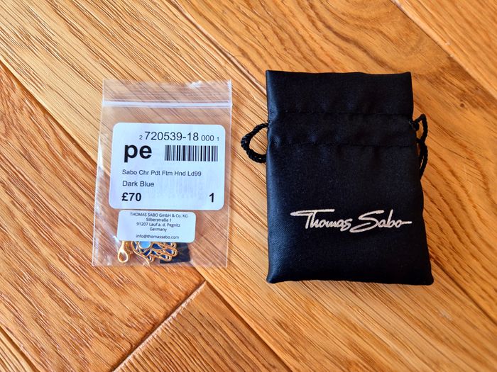 Pendentif Charm "Thomas Sabo" Main de Fatima plaqué or neuf dans blister. - photo numéro 8