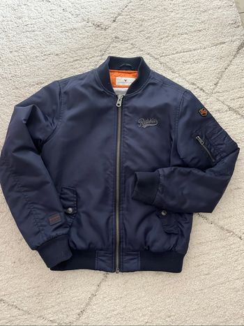 Blouson 12 ans excellent état