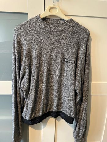 Pull col montant
