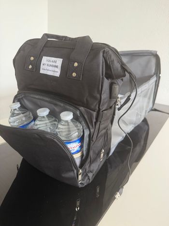 Sac à langer multifonction avec lit intégré neuf