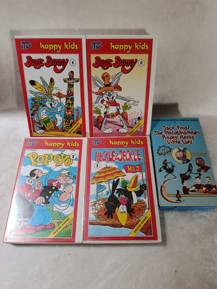 A saisir, lot cassettes VHS  " happy kids  " + 1 offerte ( bien lire svp )