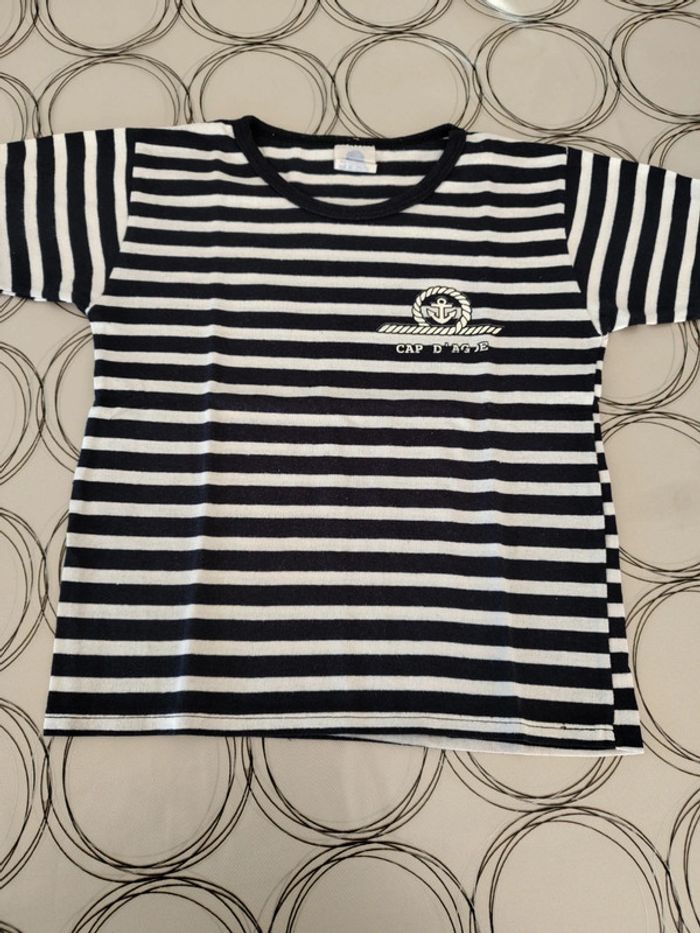 Tee shirt 8 ans très bon état