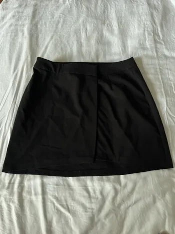 Jupe courte noire portefeuille