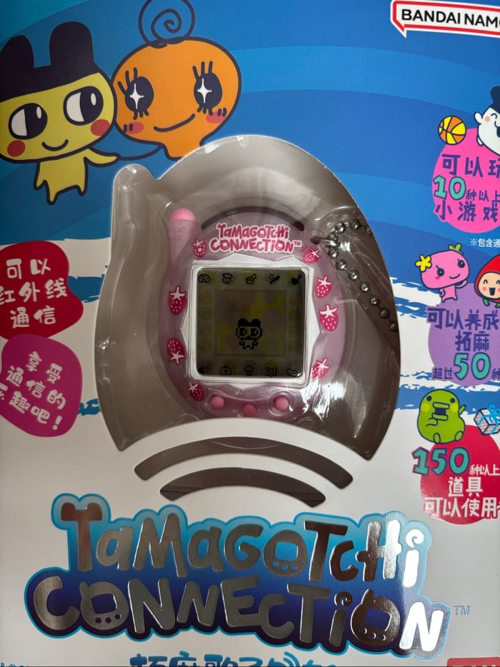 Tamagotchi connection rose lait fraises neuf