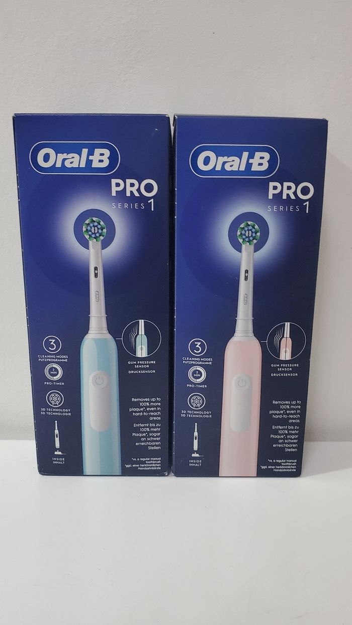 2 Brosses à Dents Électrique Oral B Pro 1, Bleu + Rose. - photo numéro 2