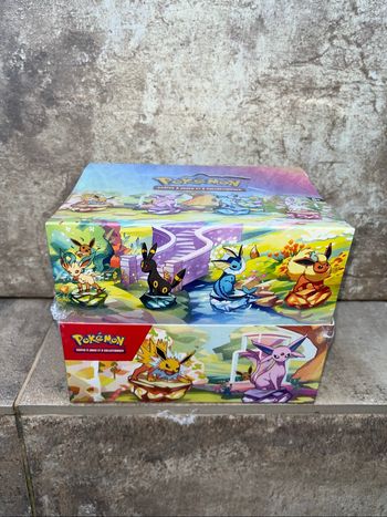 Display Pokémon mini tin 8.5 évolutions prismatiques