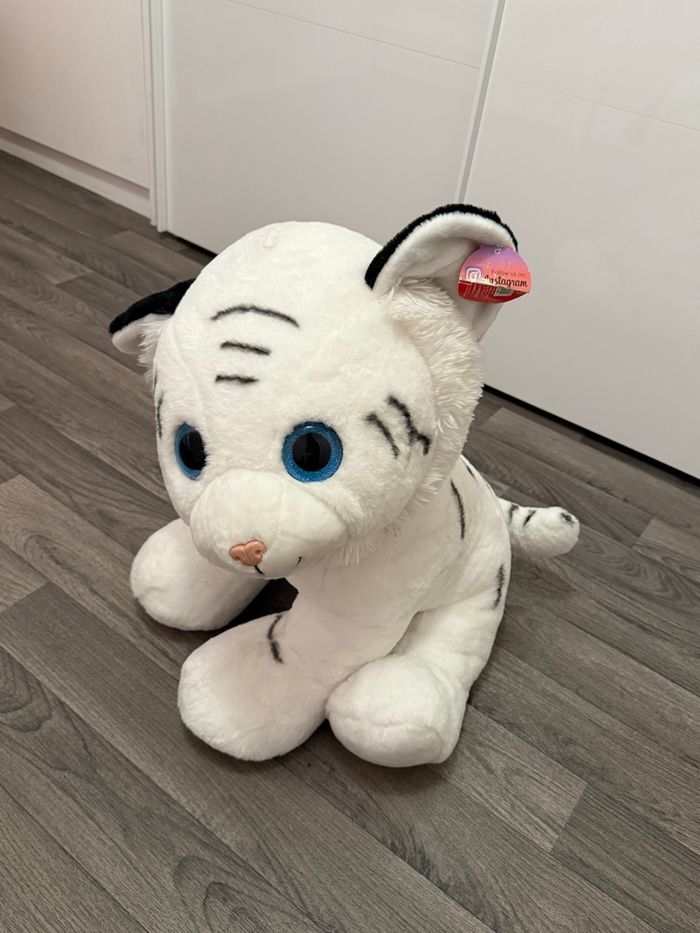 Peluche tigre blanc