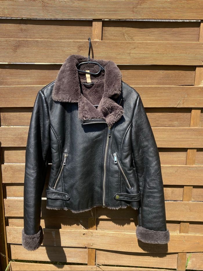 Veste en cuir moumoute