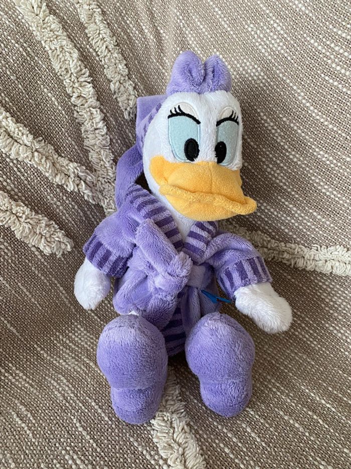 Peluche doudou 33cm Disney Daisy canard blanc et violet pyjama très bon état