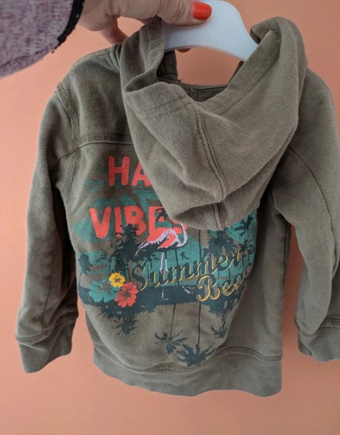 Gilet zippé avec capuche