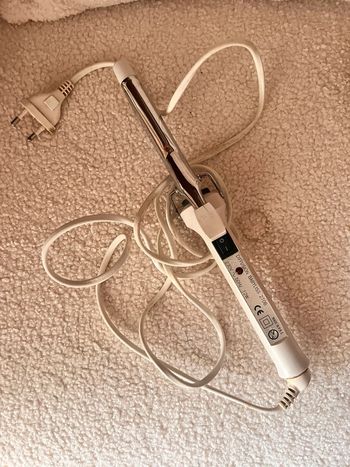 Fer à boucler avec pince