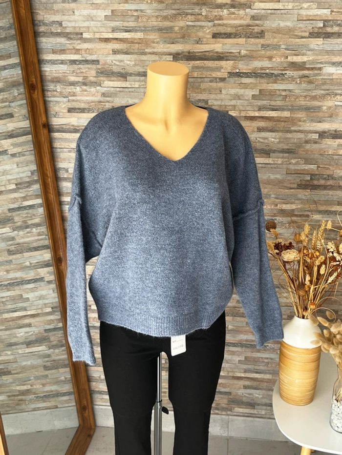 Pull bleu gris avec laine et coutures apparentes