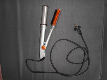 Fer à coiffer rotatif (Instyler)