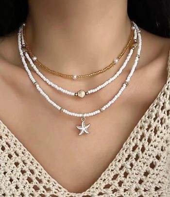 Collier 3 rangs “Étoile des mers” en acier inoxydable, perles & coquillages dorés
