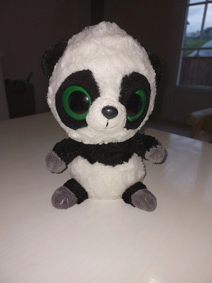 Peluche Panda aux grands yeux verts