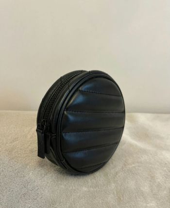 Trousse ronde matelassée YSL 