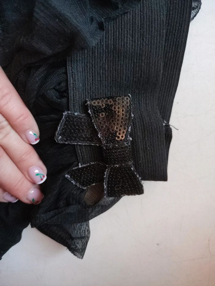 Petite jupe noire avec nœud à paillettes - photo numéro 3