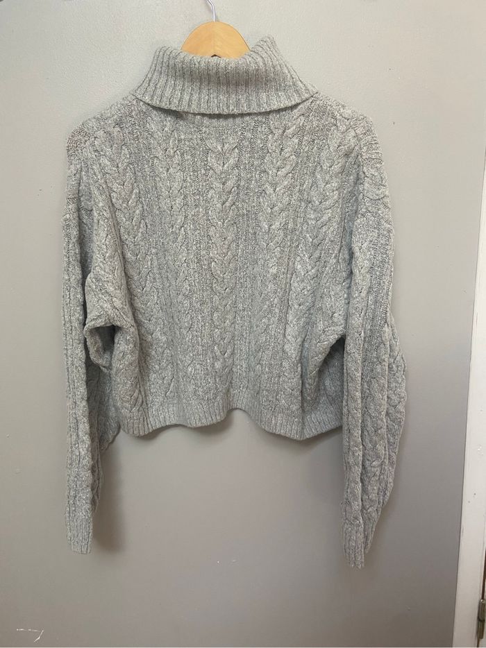 Pull col roulé