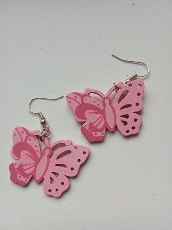 Boucles papillon rose - Neuf