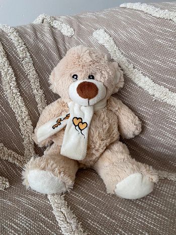 Peluche doudou 33cm Zeeman ours beige marron long poils cœur ballon parfait état