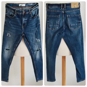 Jean troué bleu FSBN taille 16 ans