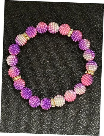 Bracelet violet rose et doré en perles taille unique jamais porté