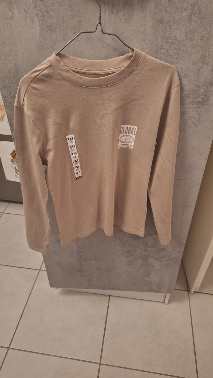 Tee-shirt uni beige manches longues col rond