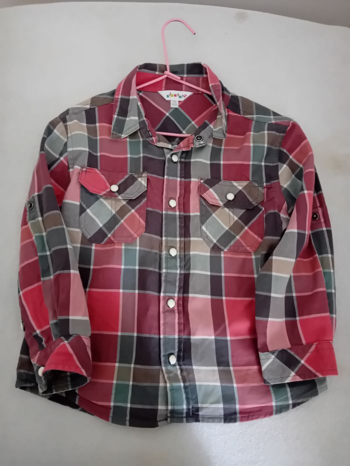 Chemise manche longue.