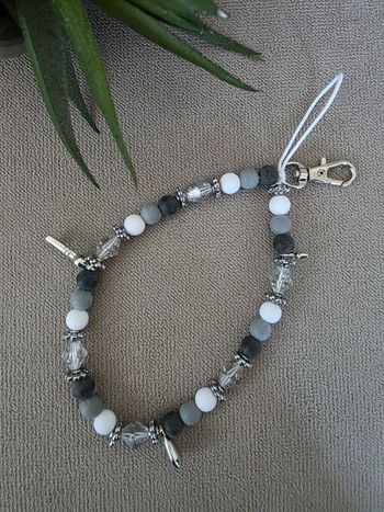 Lanière de telephone noire et grise neuve