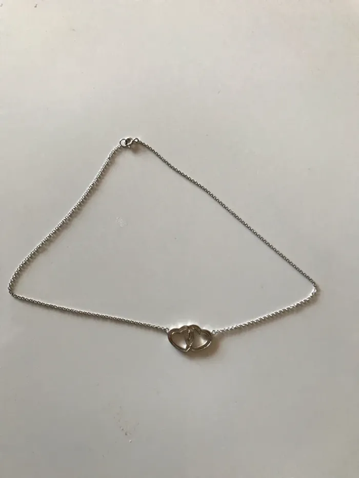 Collier en argent, cœur entre lacer - photo numéro 3