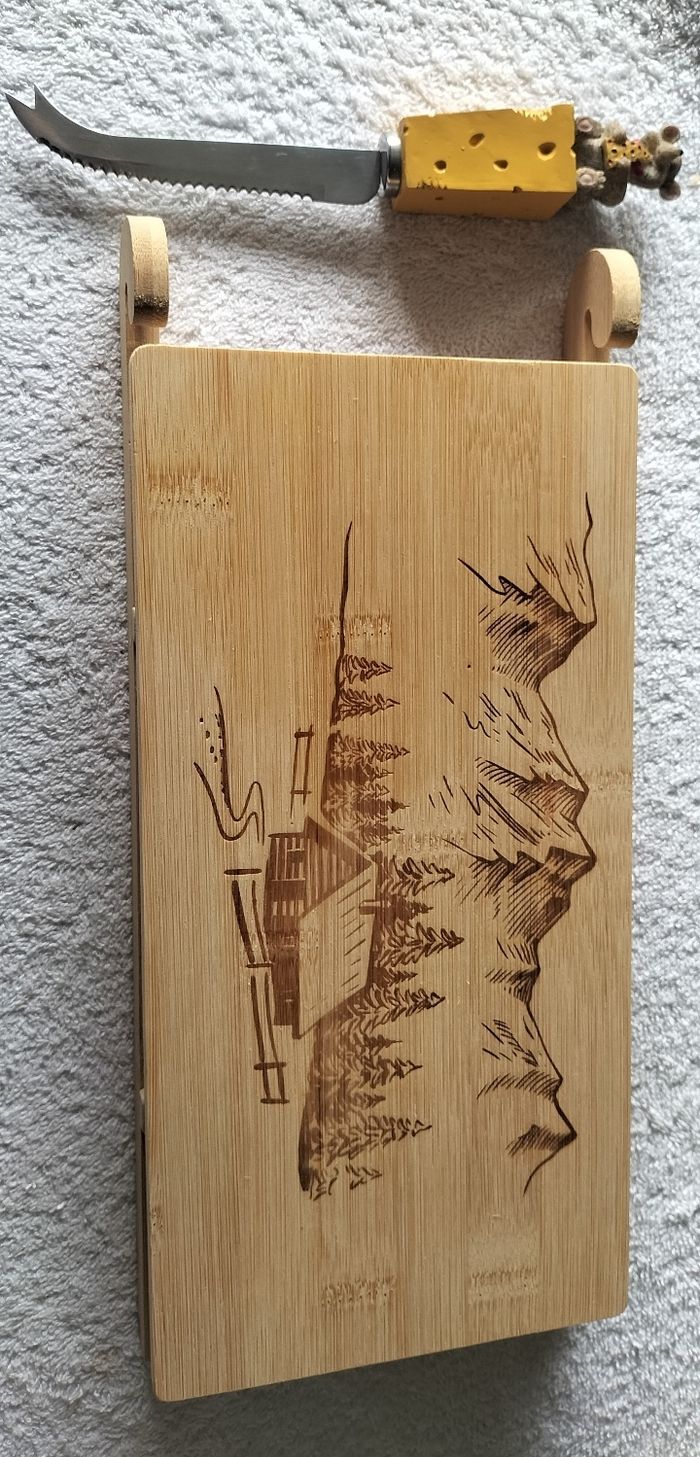 Luge planche a fromage et son couteau
