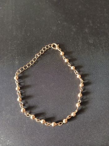 Bracelet doré avec mailles boules
