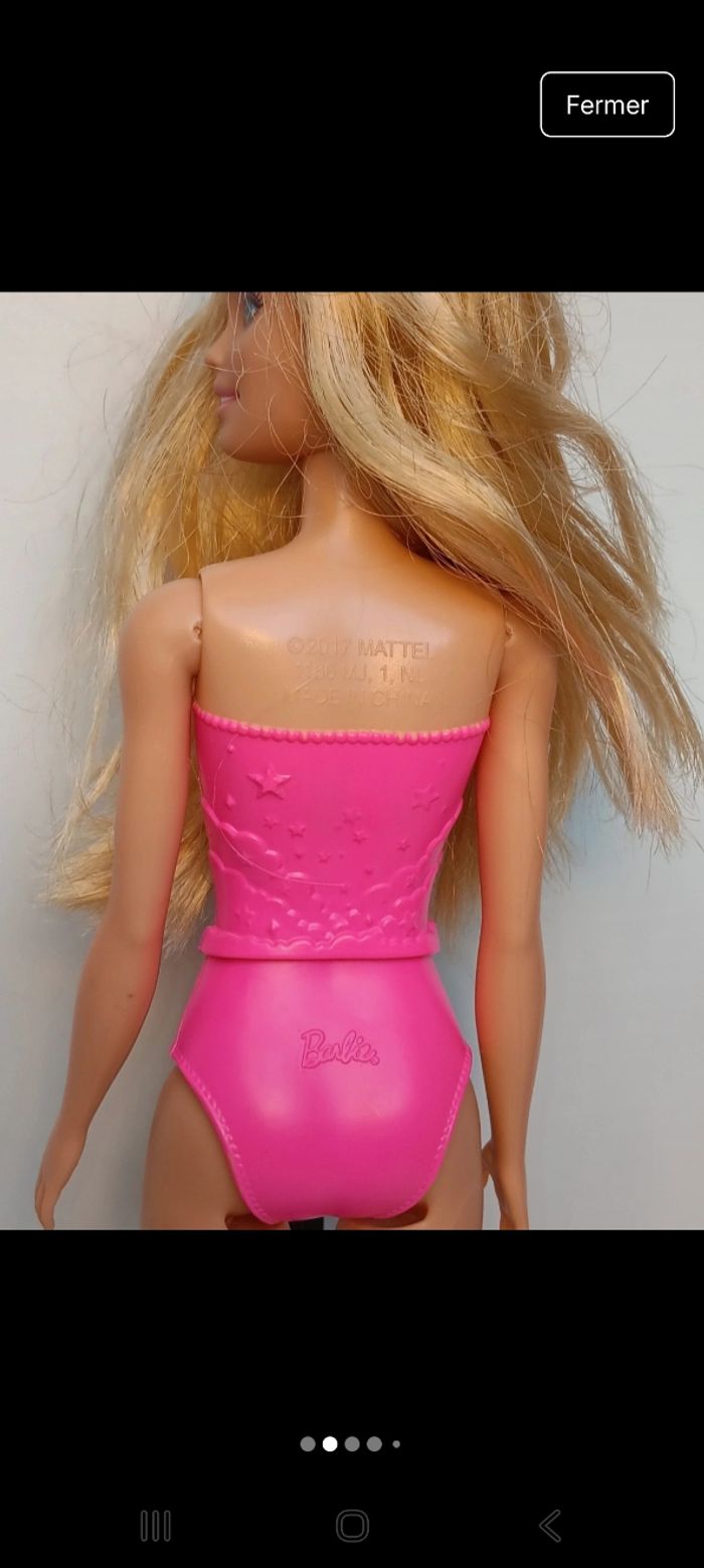Poupée mattel barbie maillot fushia et mauve tête 2013 corp 2017 
Poupée et ensemble compris - photo numéro 4