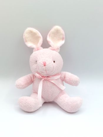 Petite peluche doudou lapin rose blanc grelot nœud satiné 18 cm assis