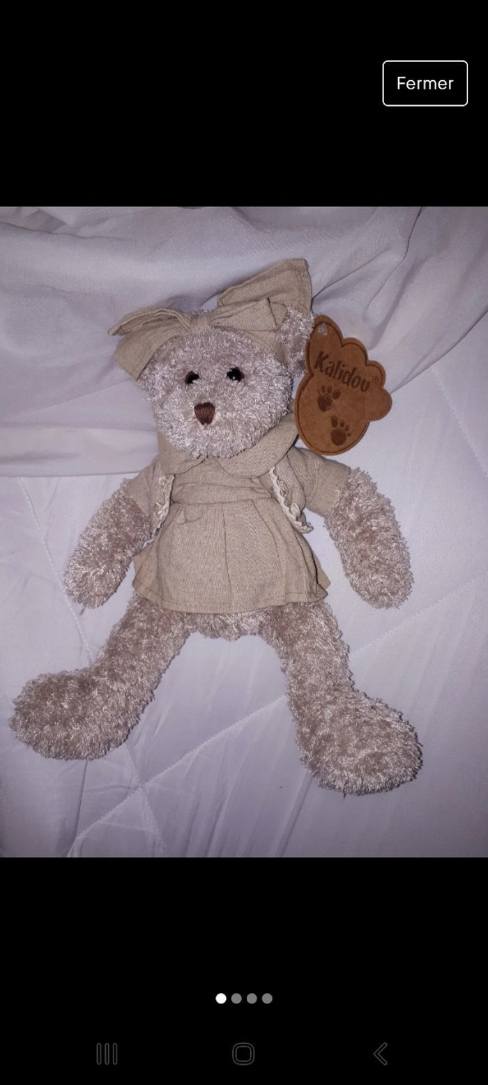 Ours en peluche oursonne 30 cm robe en lin Kalidou Enesco