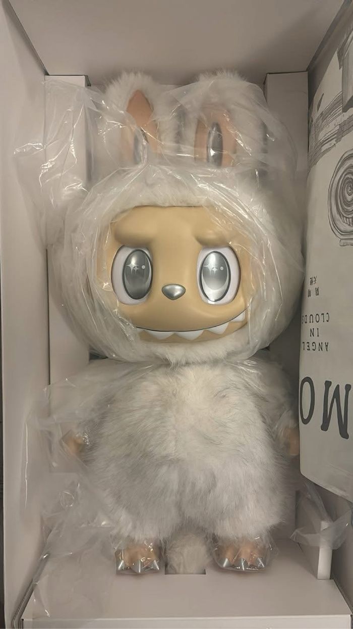 Zimomo angel in cloud