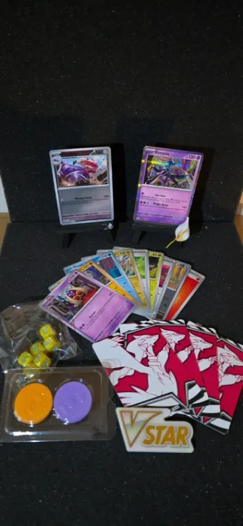 Lot de cartes Pokemon + goodies