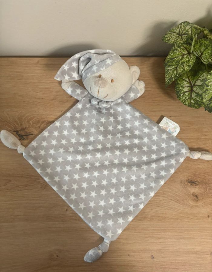 Doudou plat ours bonnet gris étoile blanches gamberritos