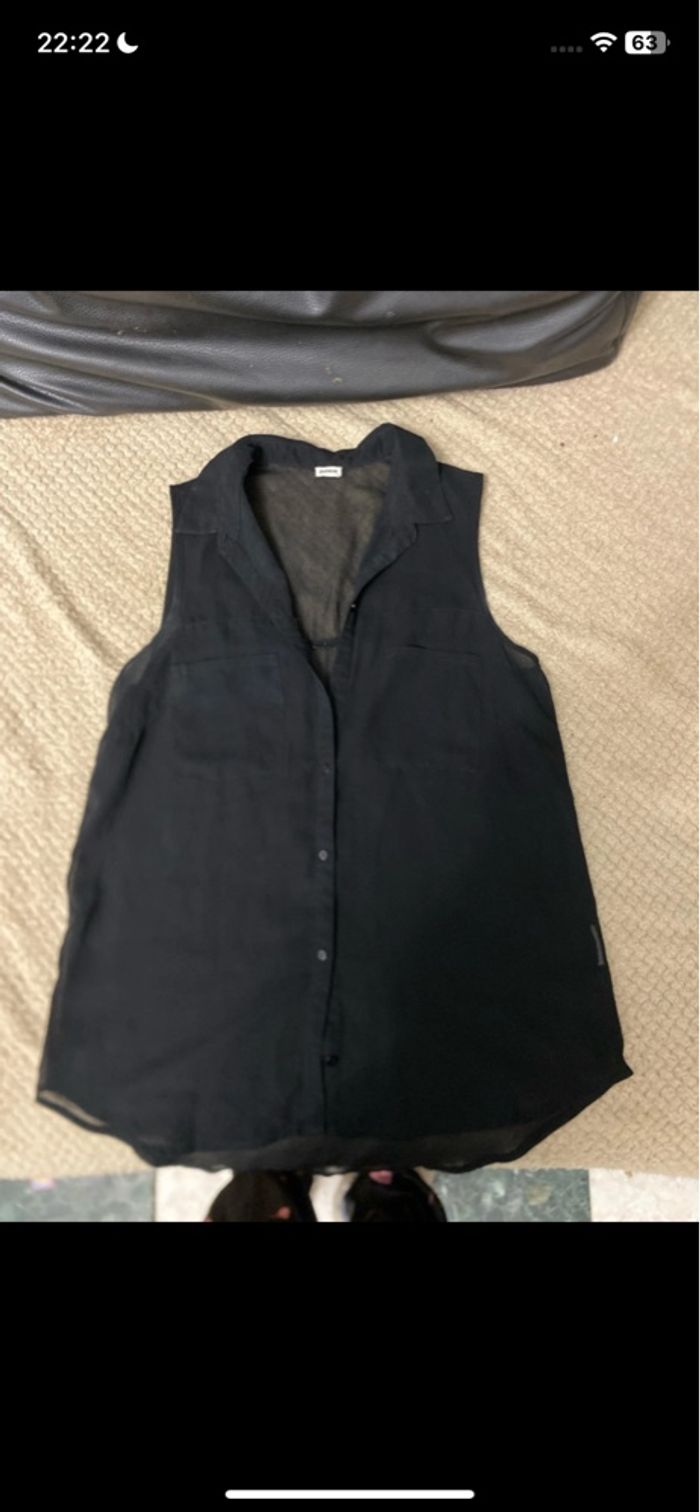 Chemisier sans manche noir transparent taille S