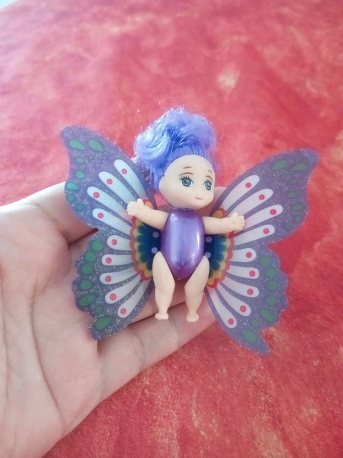 Bébé papillon mauve violet Toi Toys - photo numéro 2