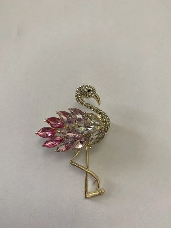 Broche flamand rose