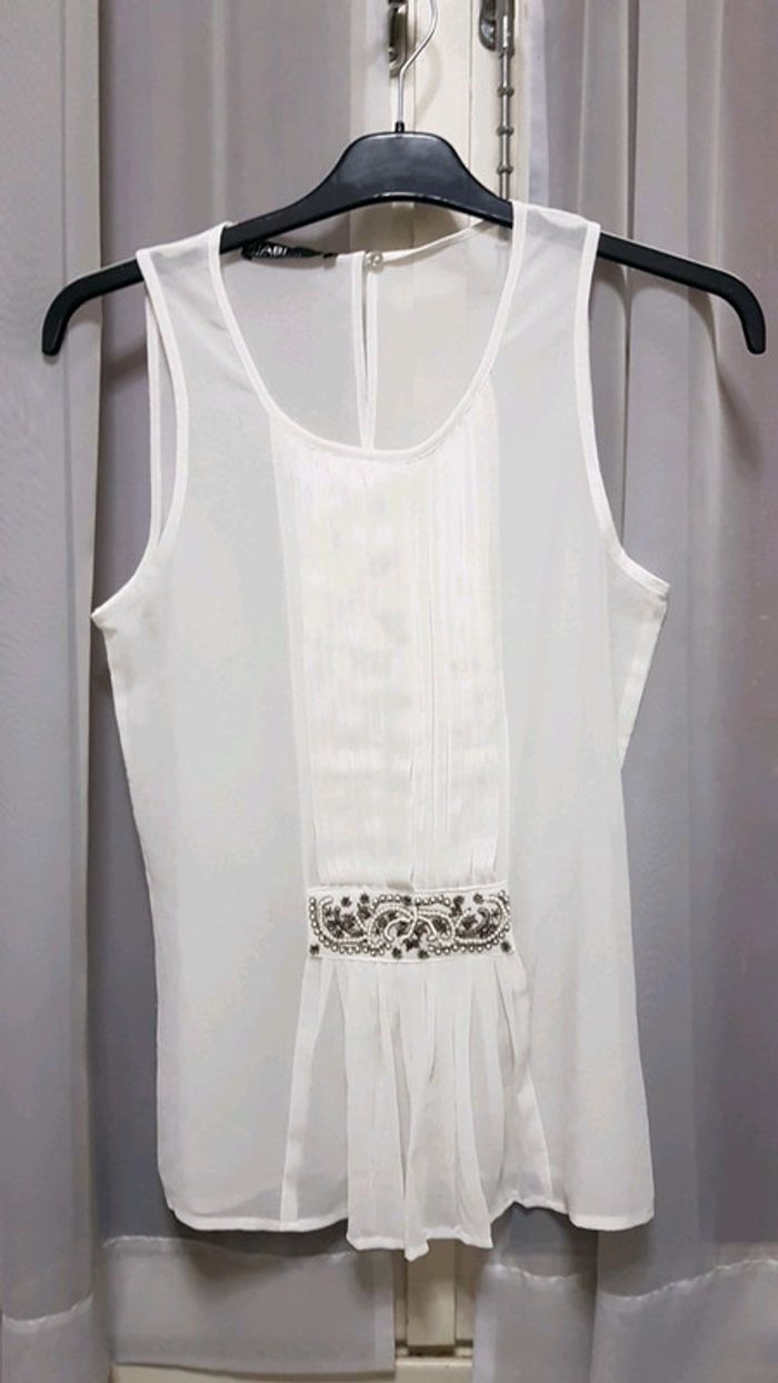 Top plissé motif en perles